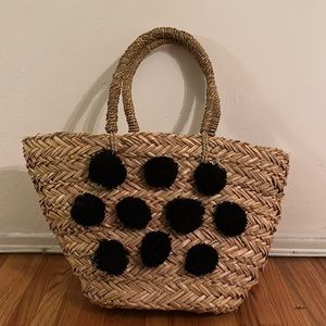 Forever 21 straw beach tote with black Pom Poms